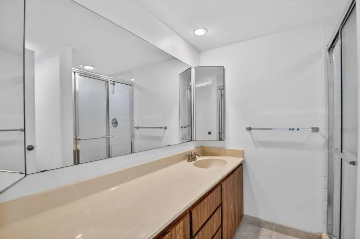 Primary bathroom has step in shower