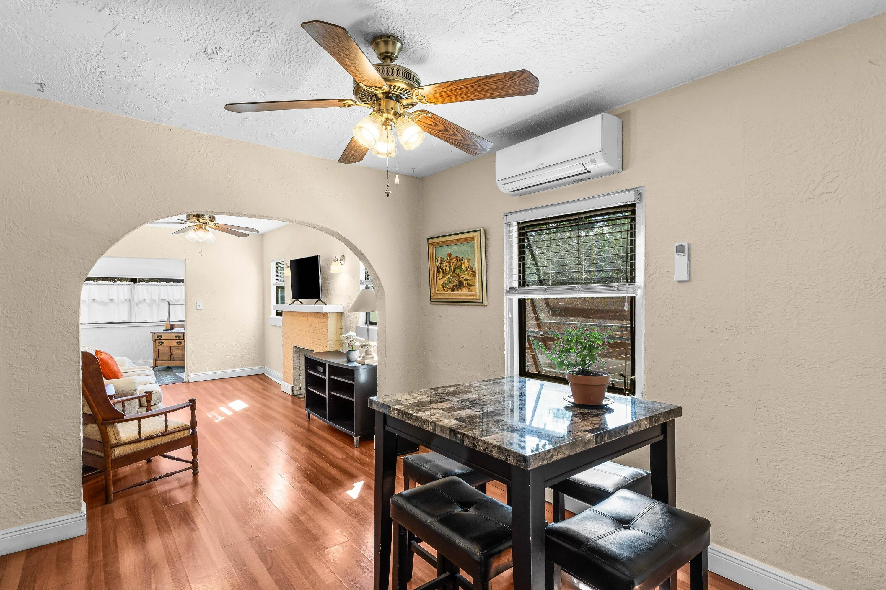 WITH ACCESS TO THE LIVING ROOM AND KITCHEN