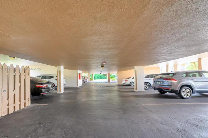 First covered parking spot A13 - next to front and back entrances