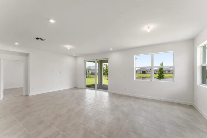 Stock photos represent builder's floorplan