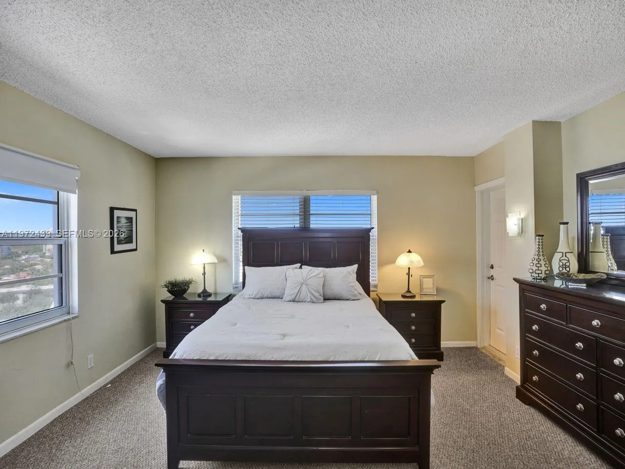 Has impact windows and additional impact door leading to balcony