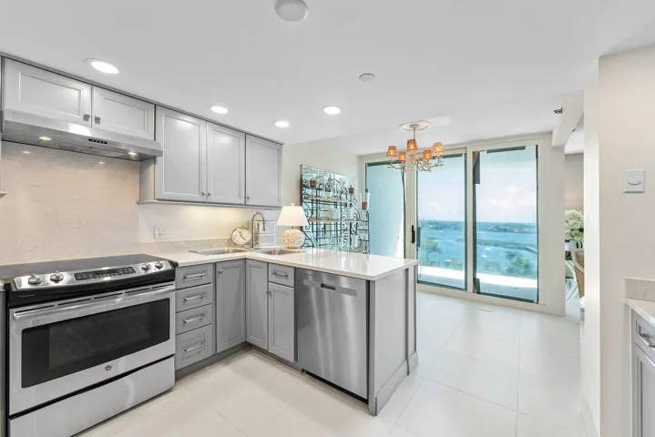 Kitchen Opens to Balcony Dining Area with Gorgeous Views