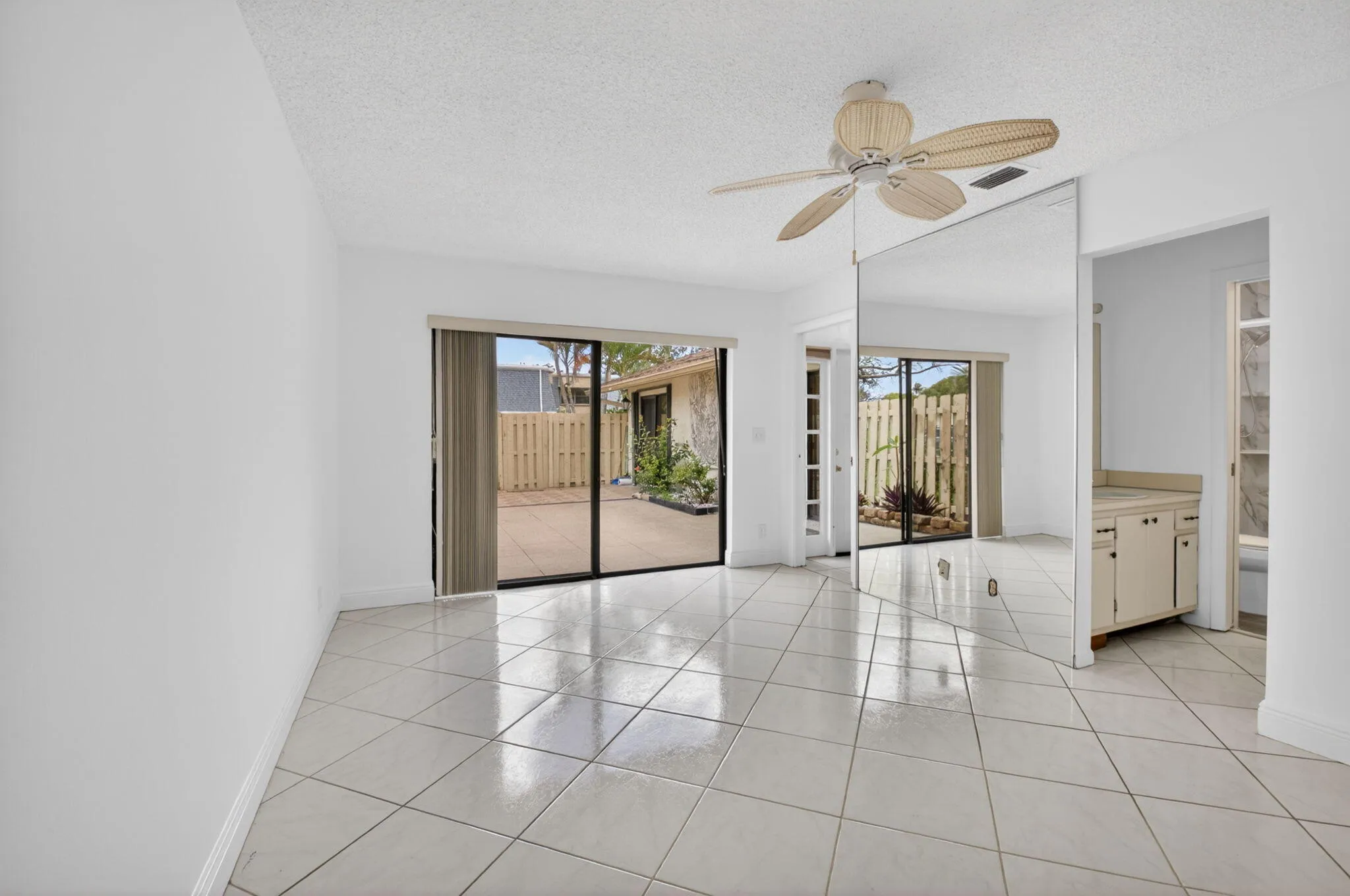 Primary bedroom with updated shower and very large walk-in closet