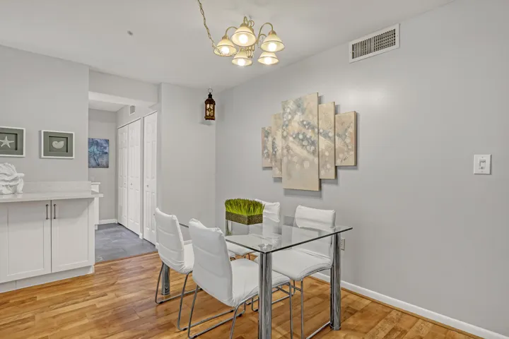 Open-concept design connects the dining area and living room, creating a comfortable layout for everyday living and gatherings.