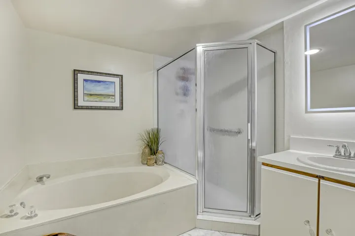 A full soaking tub and separate shower provide flexibility and comfort rarely found at this price point.