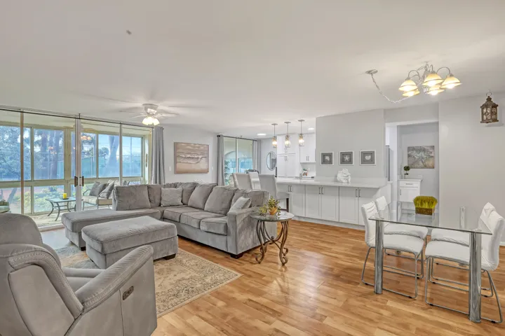 An inviting living area filled with natural light and generous space for entertaining or relaxing at home.
