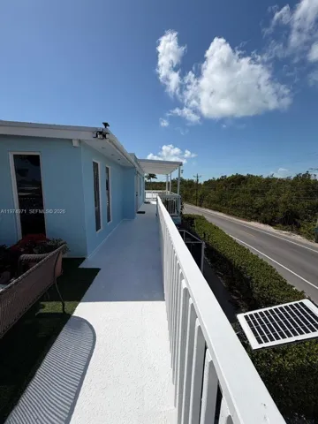 Balcony from front side towards main St. that connects all rooms