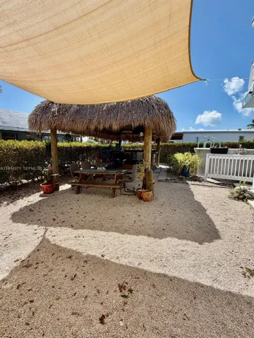 Tiki BBQ and Pool Area