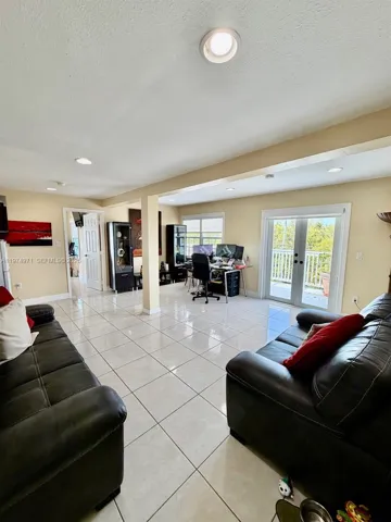 2nd floor Livingroom (view from one of the rooms entrance) with exit to terraza