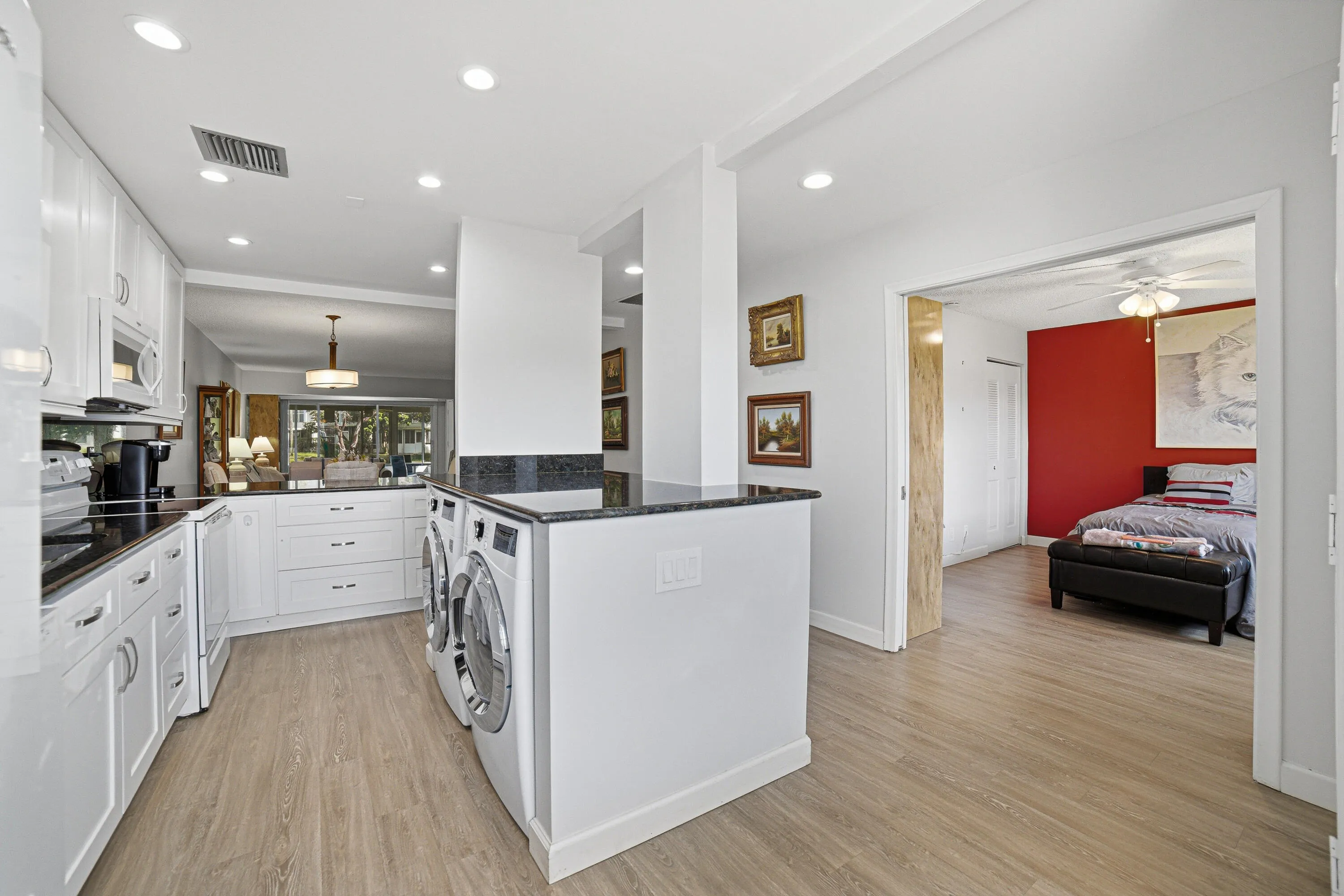 Kitchen with Granite Countertops & white Shaker cabinets