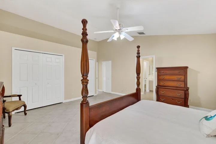 looking at bthrm & 3 closet doors