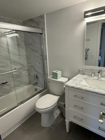 Hall bath with tub and shower