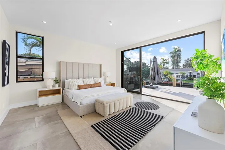 Expansive sliding glass doors leading to an outdoor patio