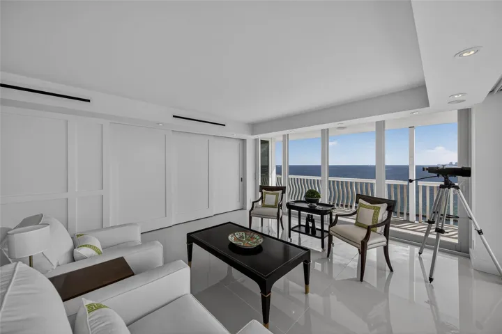 Living Room with Sliding Wall System To Den Closed