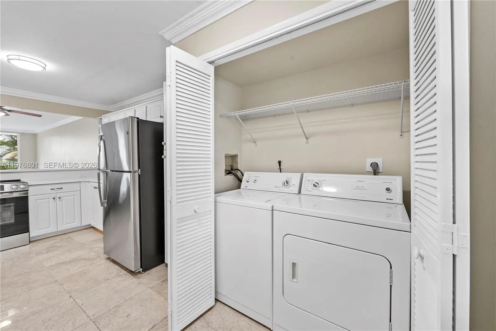 Laundry area includes washer and dryer
