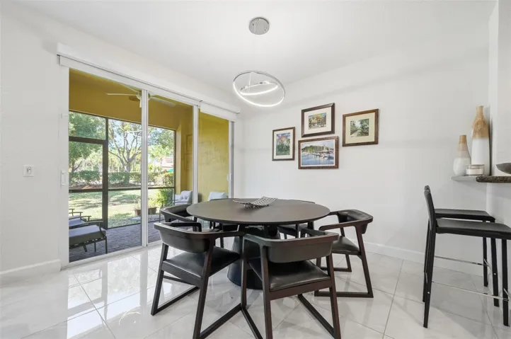 Dining area overlooking back patio and garden