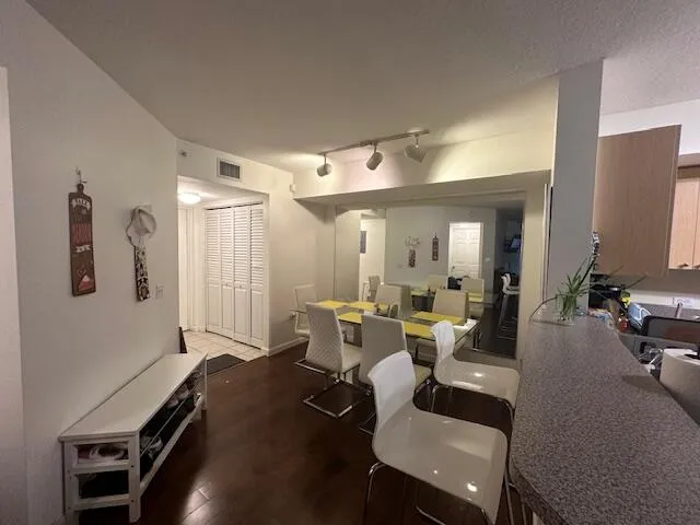 entrance from front door hallway and full size washer & dryer