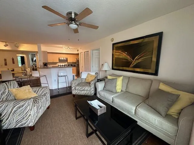 Fully Furnished turnkey 2 bed 2 bath condo with covered patio, SS appliances, Gated community, across from the intracoastal waterway Amenities include Fitness center, indoor basketball court /practice pickleball in A/C, pool, jacuzzi, BBQ poolside. Entire community was renovated