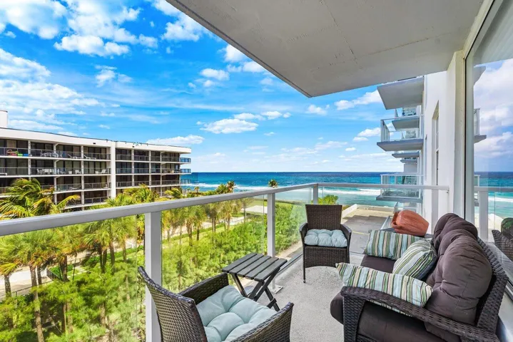 Beautiful Covered Balcony with Plenty of Sitting Room, Views of the Ocean to the East and the Intracoastal to the West.