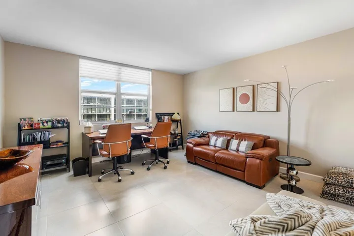 Second Bedroom has Porcelian Tile Floors and Views of the Ocean to the East