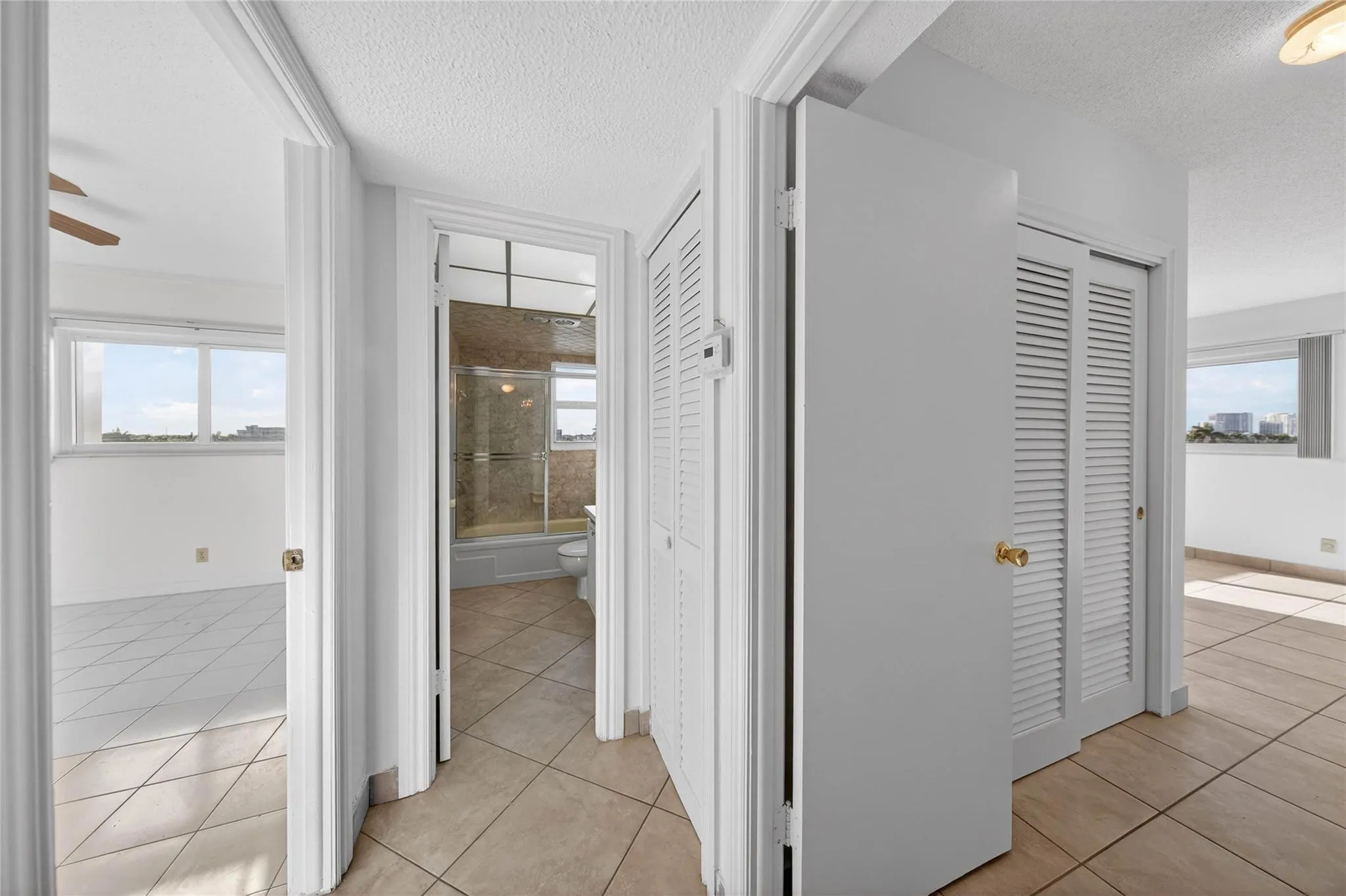 Hallway Leading to Bedrooms and Guest Bath