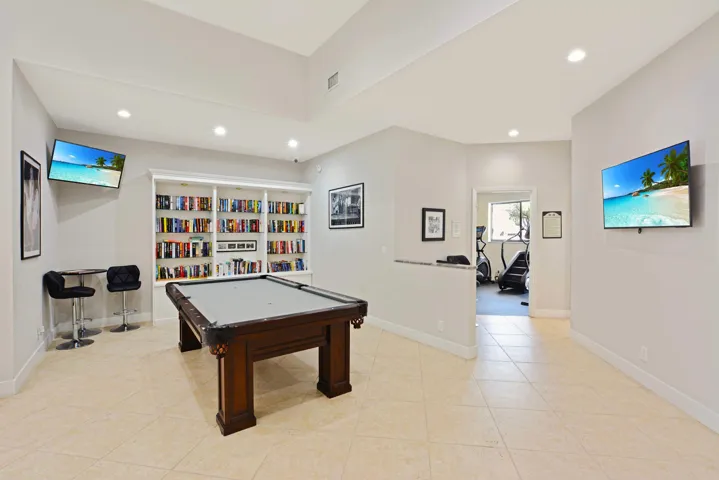 Spacious Billiard room and library.