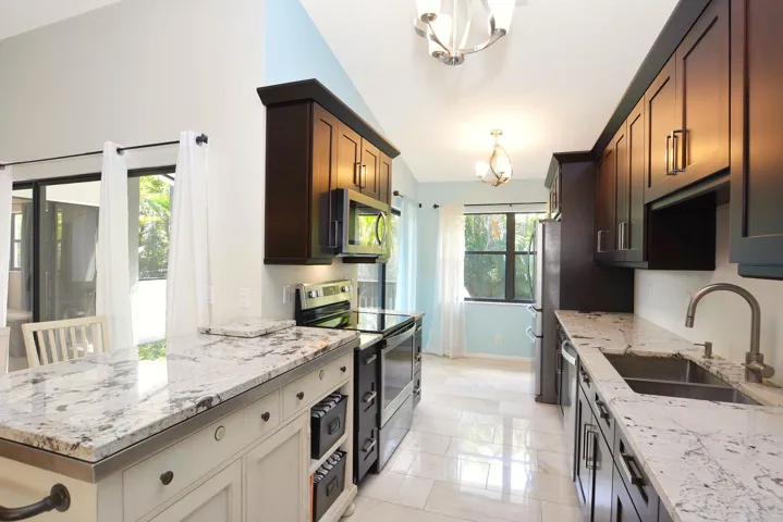 Lots of natural light and extra cabinetry with redesign.
