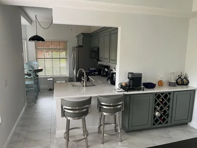 Open Kitchen With All New Cabinetry and Appliances