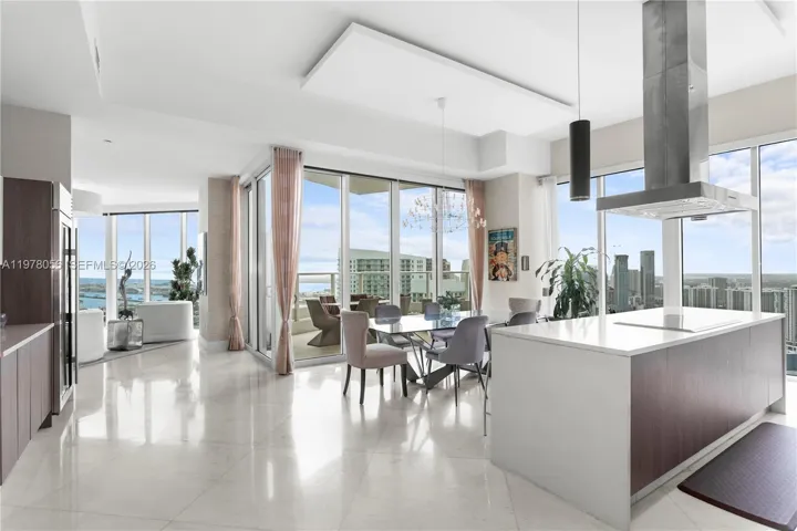 Kitchen and dining area with city views