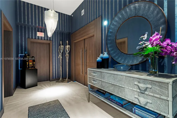 Double Entry Door connecting private foyer