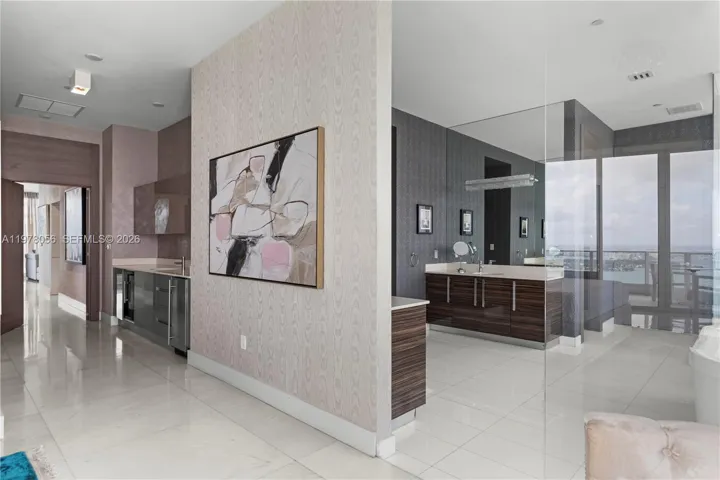 Open primary suite with spa-style bathroom