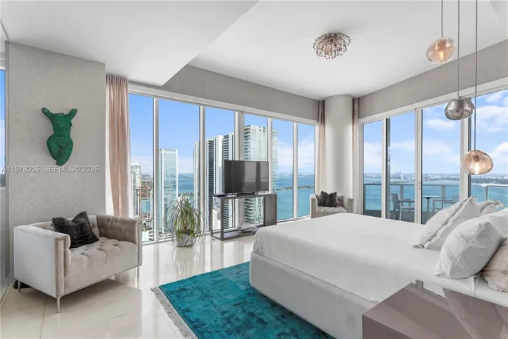 Spacious primary suite with panoramic water views. North and East Views