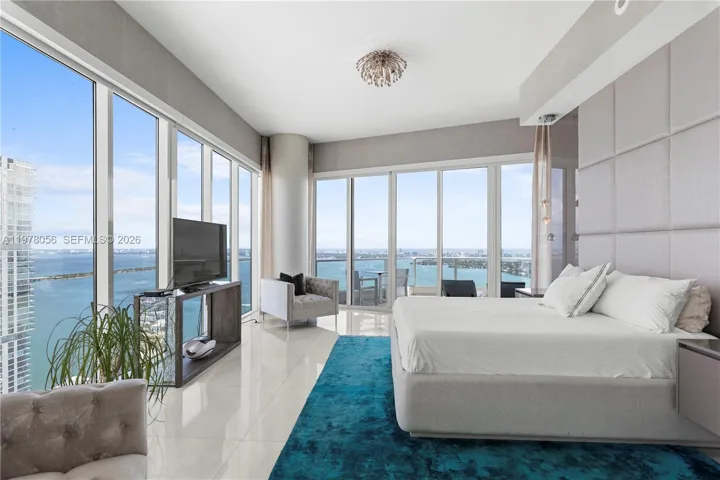 Primary suite with expansive corner windows