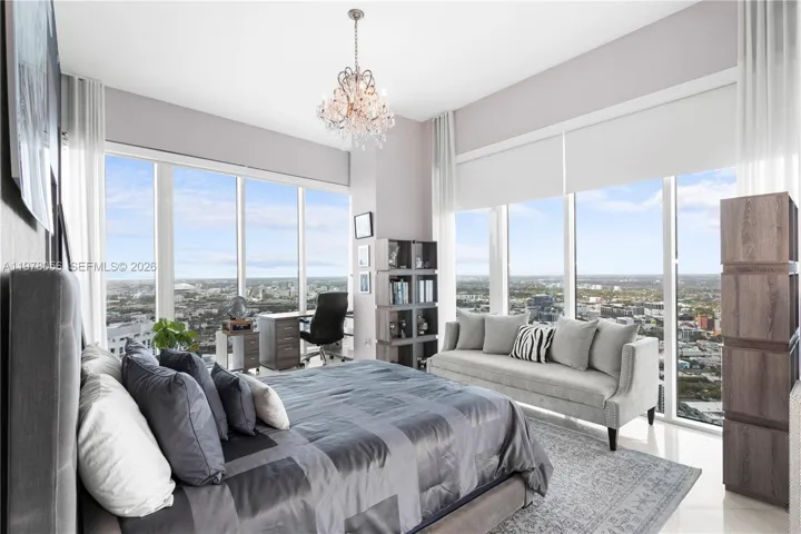 Bright bedroom with floor-to-ceiling windows. South and West​​‌​​​​‌​​‌‌​‌‌​​​‌‌​‌​‌​‌​​​‌​​ views