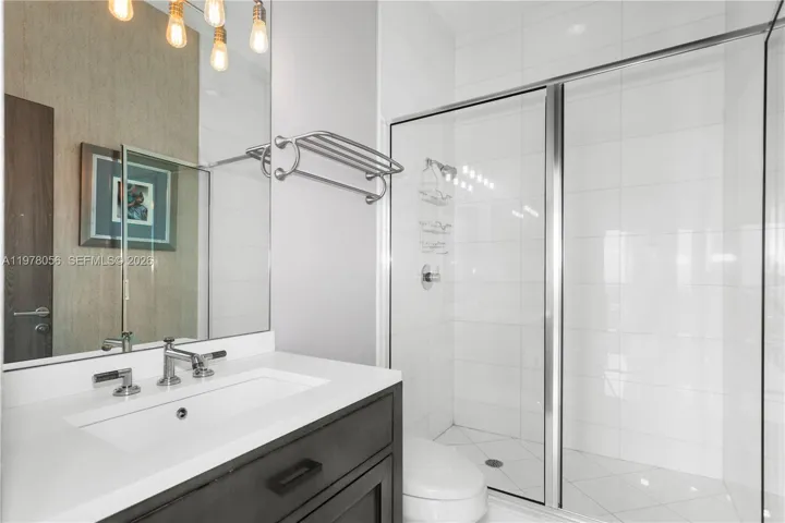 Modern bathroom with glass shower enclosure