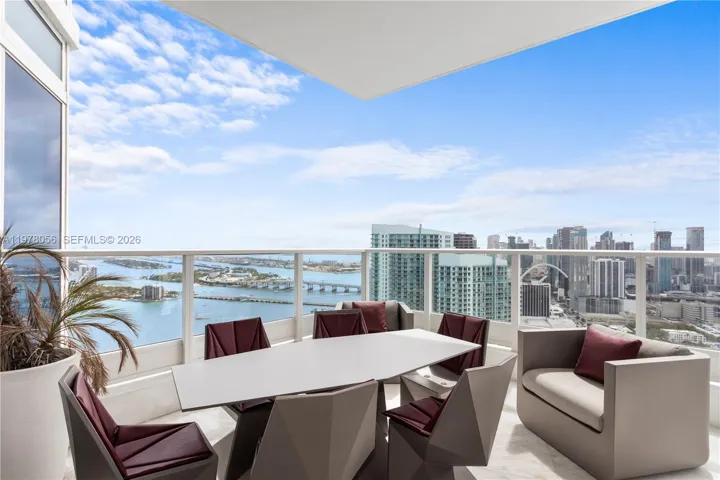 Private balcony dining with bay views. South & South East