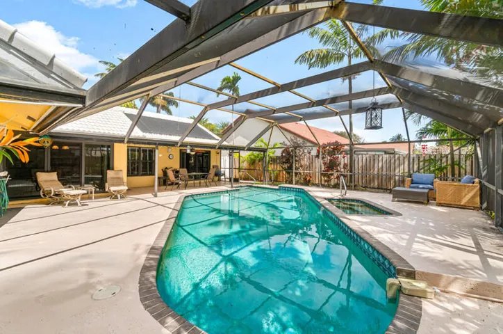 Pool with screen enclosure.