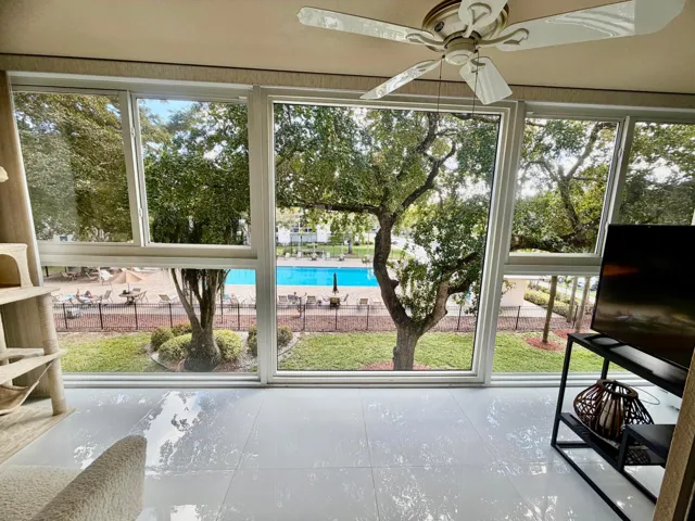 BALCONY BOASTS NEW SUBLFOOR under NEW 31" PORCELAIN TILE installed along with COMPLETE IMPACT CAT-4 GLASS on BALCONY & WINDOWS in unit-2023!!