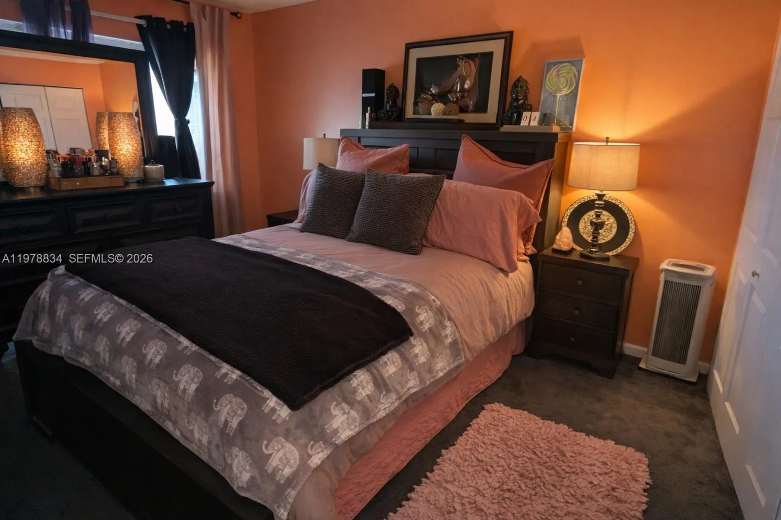econd bedroom featuring a sliding glass door with access to its private balcony