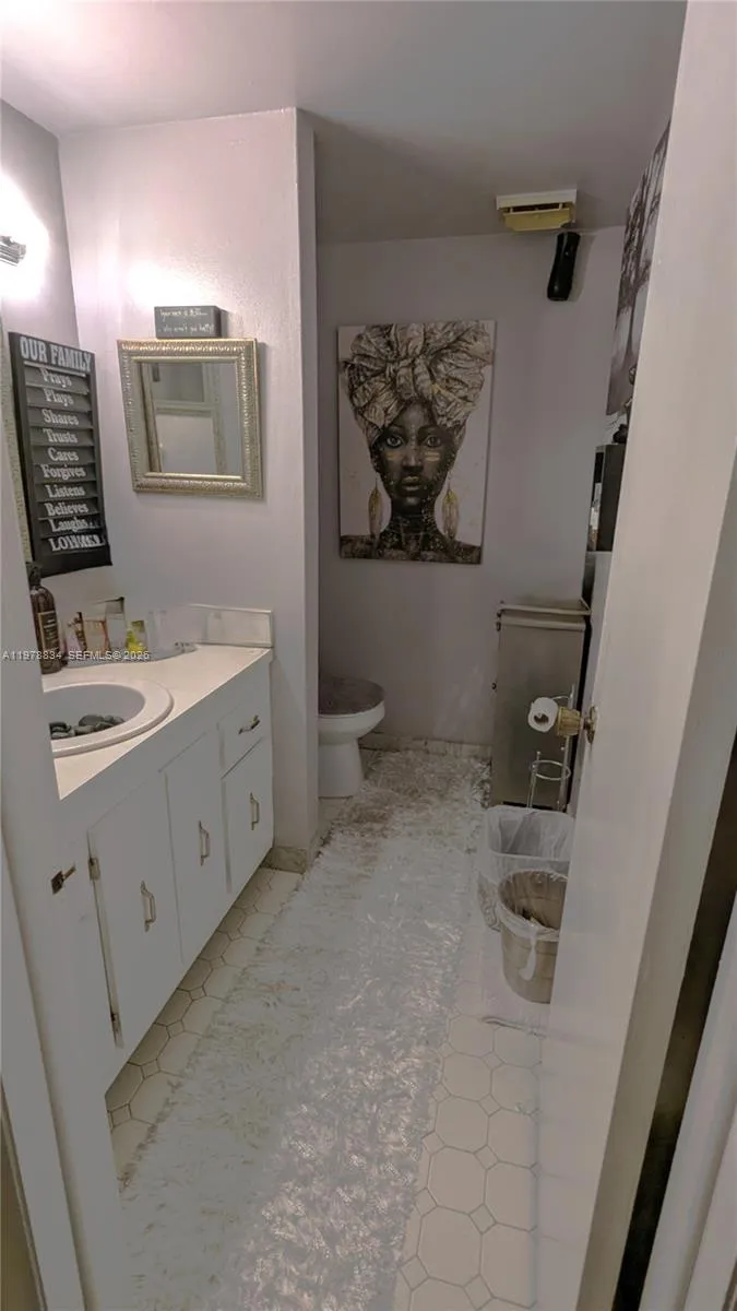 Guest Restroom - Convenient first-floor guest bathroom with a functional layout.