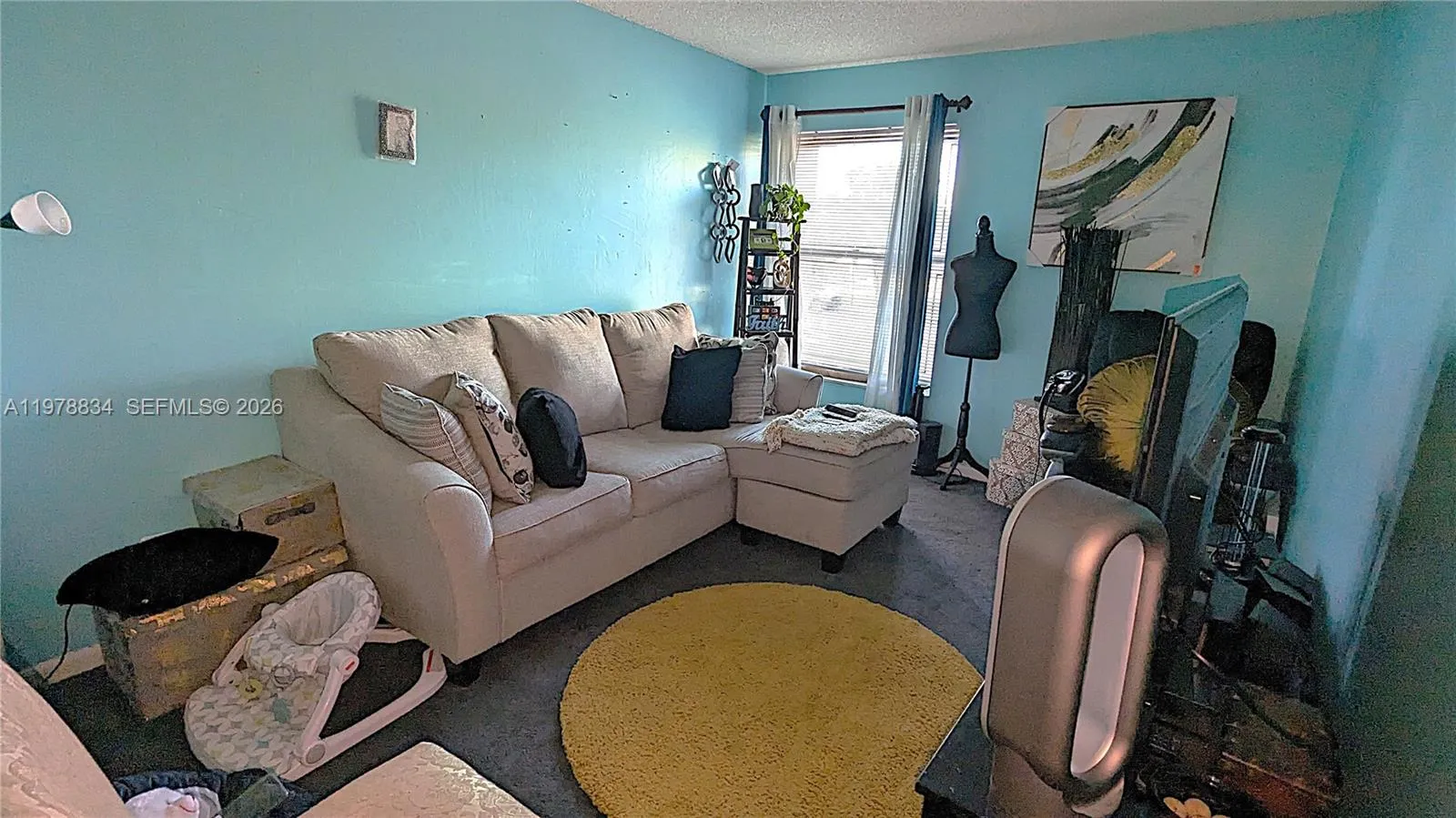 Well-sized bedroom presently serving as an office space