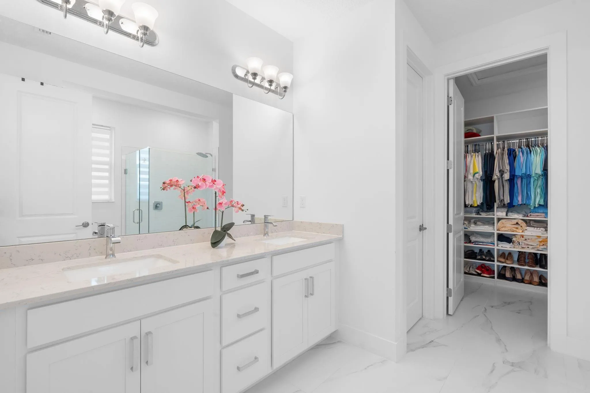 Large En Suite Double Vanity with Modern Quartz Counter Top and Porcelain Sinks