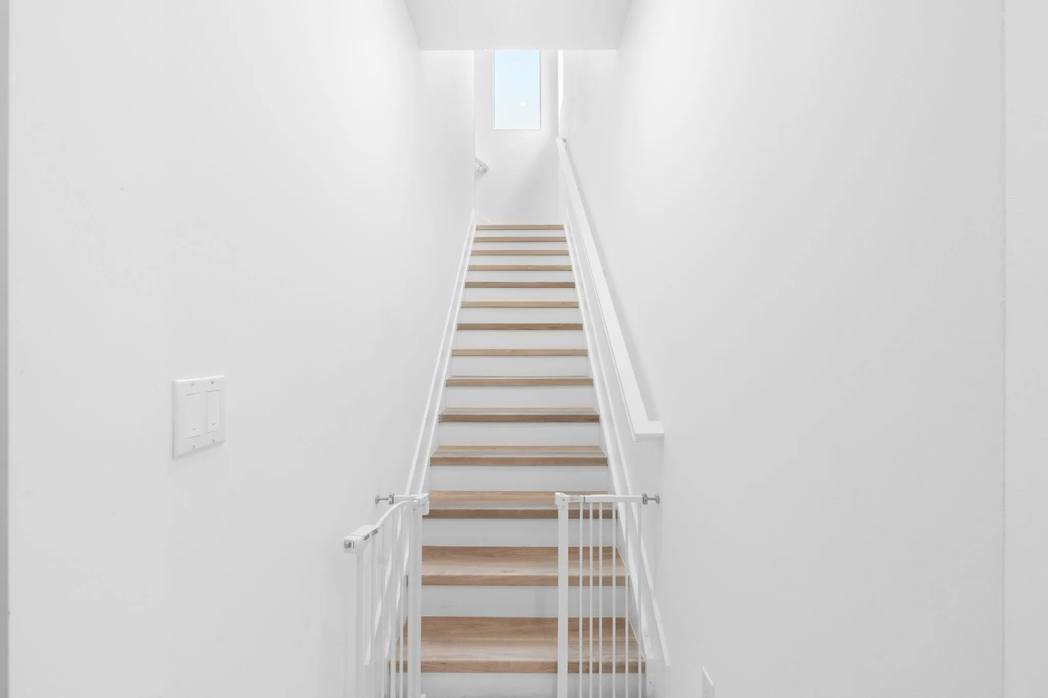 Stairs and and Second Floor Primary Suite have Beautiful Durable Vinyl. No carpet anywhere in the home.
