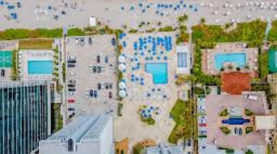 AERIAL ON THE SAND LOCATION POOL VIEWS