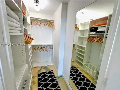 BEDROOM WALK-IN CLOSET