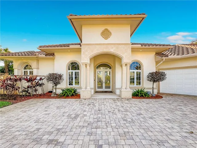 Tis home features so much beauty, tile Roo garage. f, all Impact window and doors, oversized 3 car garage and golf cart garage. circular driveway.