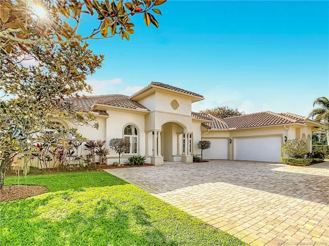 Tile roof, Impact windows the whole home. Paver driveway circular. 3 car garage with a golf cart garage. Double entry doors desinger glass. What a beauty on the 8th fairway.