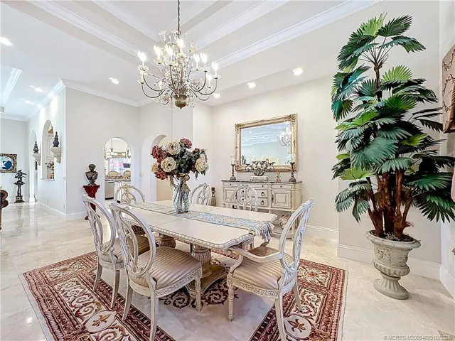 You can see the flow from dining room, Livingroom and into the kitchen area. Works so well together. It is a great room withopen concept, marble floors, high ceiling and more.