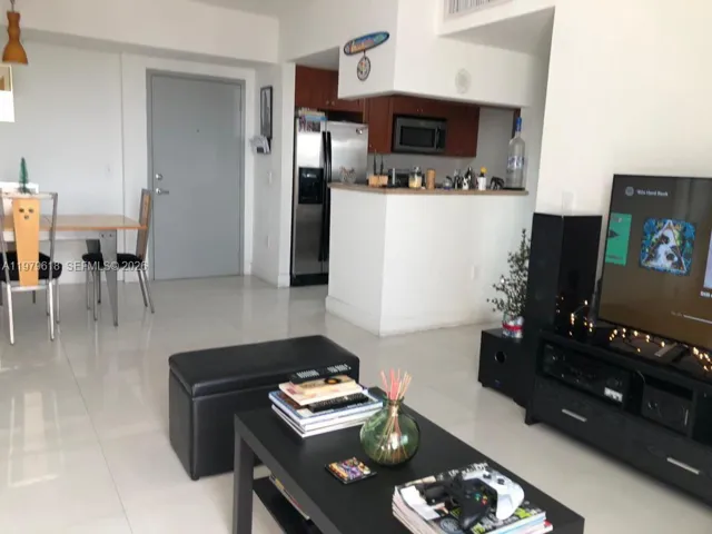 Living room, dining room, kitchen.