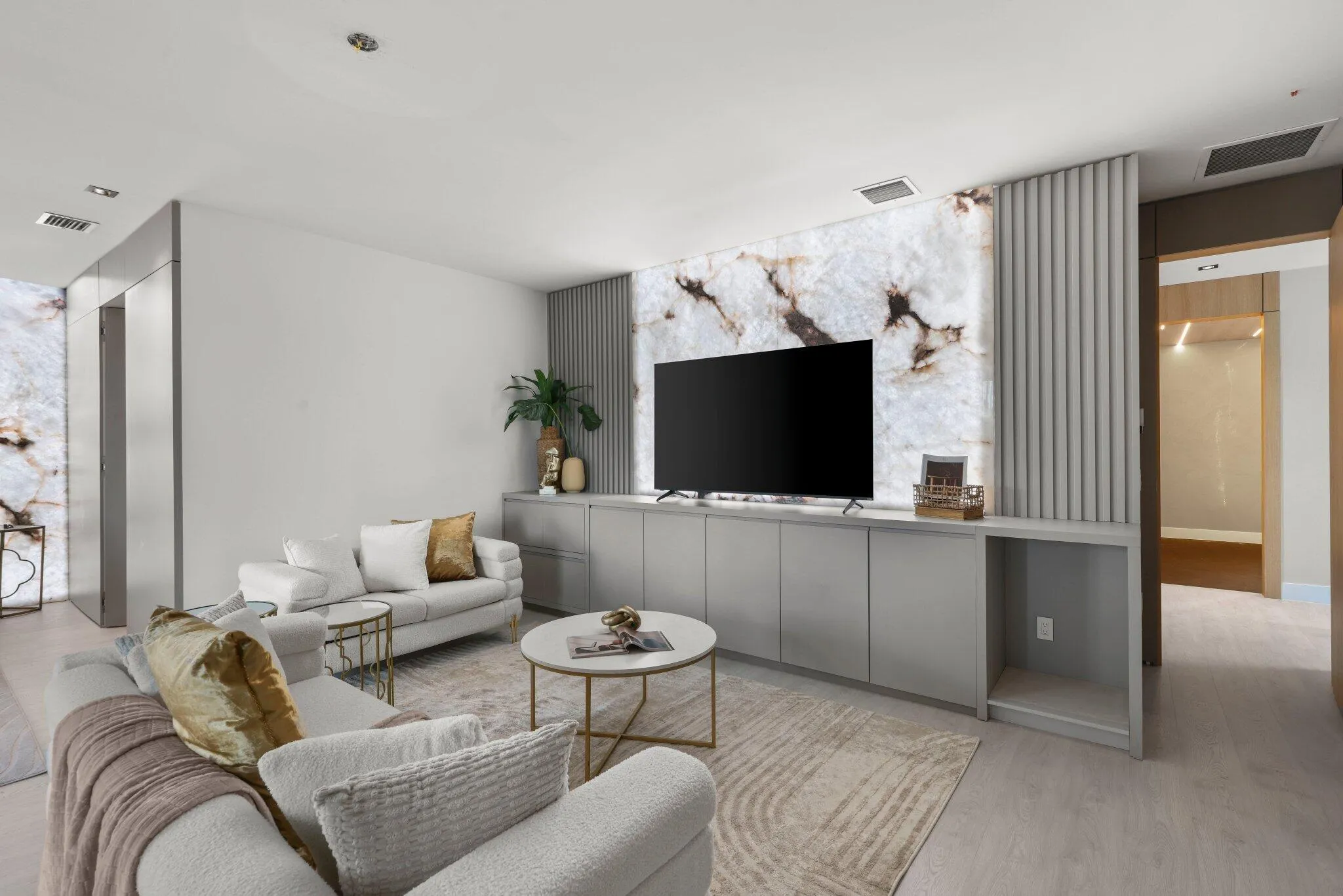 Primary Suite Sitting Area w/ custom onyx wall decor